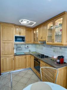 Η κουζίνα ή μικρή κουζίνα στο NEVA apartman