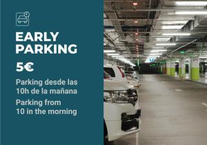 a parking garage with cars parked in it at Apartamento Turístico Royal, by CartagenaSpain in Cartagena