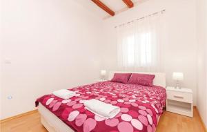 Posteľ alebo postele v izbe v ubytovaní Two-Bedroom Holiday Home In Radonic