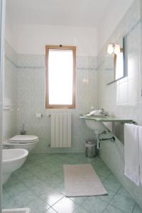 Koupelna v ubytování Motel Monterosa + 15 fotografií