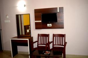 TV a/nebo společenská místnost v ubytování Blooming Star Guest House