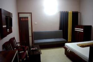 Postel nebo postele na pokoji v ubytování Blooming Star Guest House