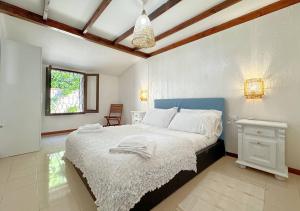 Posteľ alebo postele v izbe v ubytovaní Solemar Sicilia - Seaside House Capo Zafferano