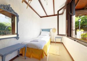 Posteľ alebo postele v izbe v ubytovaní Solemar Sicilia - Seaside House Capo Zafferano