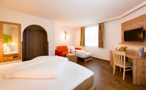 Letto o letti in una camera di Hotel Gasthof Zum Schwanen