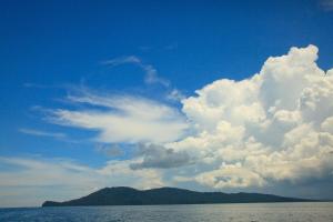 a cloudy sky over a body of water at Costa Aguada Island Resort, Guimaras in Guimaras