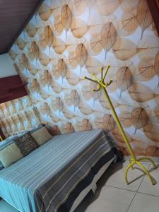Giường trong phòng chung tại Espaço Lux Betim