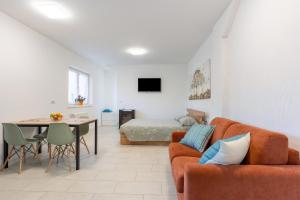 Posezení v ubytování Esther House Terlan