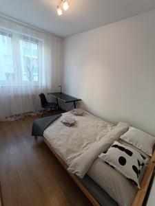 Postel nebo postele na pokoji v ubytování minimalistic + 16 fotografií