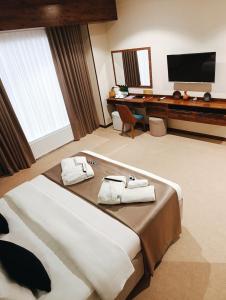 TV a/nebo společenská místnost v ubytování Violet