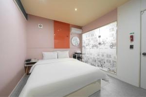Postel nebo postele na pokoji v ubytování Good Time Hotel