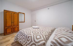 Postel nebo postele na pokoji v ubytování 1 Bedroom Lovely Apartment In Rakovica