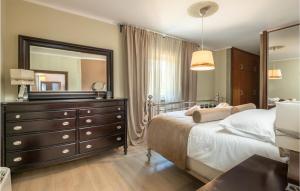 Ein Bett oder Betten in einem Zimmer der Unterkunft Awesome Home In Sumber
