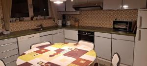 Η κουζίνα ή μικρή κουζίνα στο A home away from home