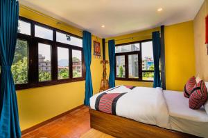 Letto o letti in una camera di Thamel Heritage Hostel