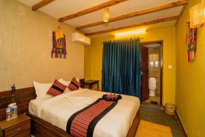 Letto o letti in una camera di Thamel Heritage Hostel