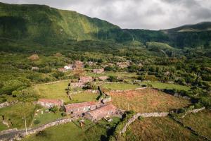 an aerial view of a village in the mountains at Aldeia da Cuada in Faja Grande