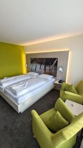 Postel nebo postele na pokoji v ubytování Hotel Gierer