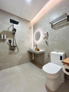 Koupelna v ubytování ONE18 Boutique Hotel
