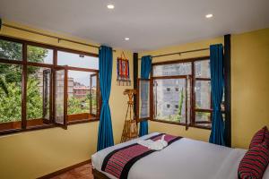Letto o letti in una camera di Thamel Heritage Hostel