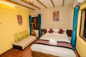 Letto o letti in una camera di Thamel Heritage Hostel