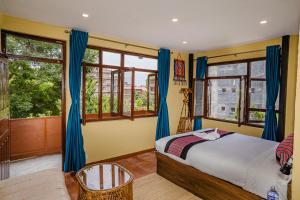 Letto o letti in una camera di Thamel Heritage Hostel