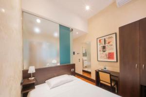 Postel nebo postele na pokoji v ubytování Century Hotel