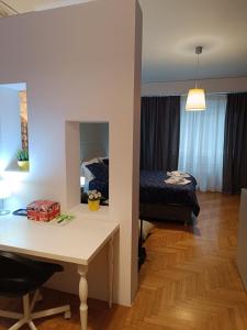 Ένα ή περισσότερα κρεβάτια σε δωμάτιο στο Plaka Hideaway Suite +11 φωτογραφίες