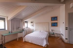 Postel nebo postele na pokoji v ubytování Century Hotel
