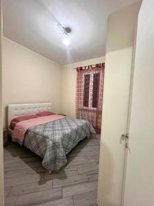 Postel nebo postele na pokoji v ubytování Edi Apartments