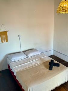 Postel nebo postele na pokoji v ubytování Padang Hostel