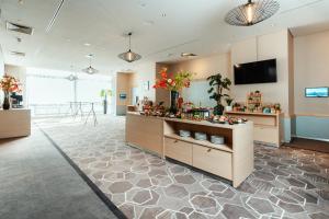 Μια τηλεόραση ή/και κέντρο ψυχαγωγίας στο Leonardo Royal Hotel Köln - Am Stadtwald