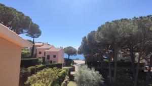 a view of a house with trees and a road at VILLAS COSETTE Villa Cami de les Penyes in GRO