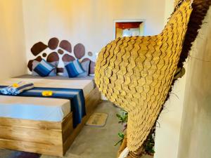 Letto o letti in una camera di Secret Swell