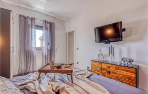 Postel nebo postele na pokoji v ubytování Villa La Vrana