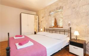 Posteľ alebo postele v izbe v ubytovaní Three-Bedroom Holiday Home In Podgrade