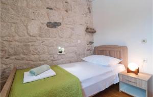 Posteľ alebo postele v izbe v ubytovaní Three-Bedroom Holiday Home In Podgrade