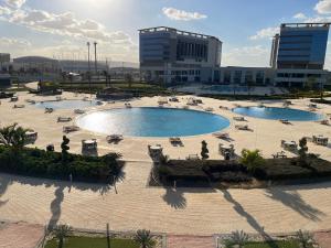 Bazén v ubytování Tolip Olympic International City nebo v jeho okolí