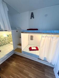 Postel nebo postele na pokoji v ubytování Backpackers Las Eras + 28 fotografií
