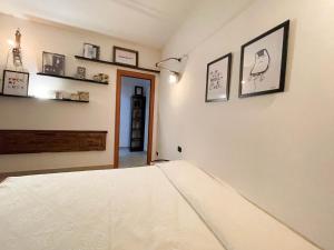 Letto o letti in una camera di InCorteDaFabio Design flat with Bikes