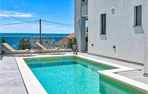 a swimming pool in the middle of a building at Villa Futura in Zadar