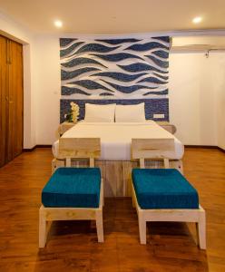 Postel nebo postele na pokoji v ubytování Binnacle Negombo