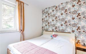 Postel nebo postele na pokoji v ubytování Holiday Home Valbandon I