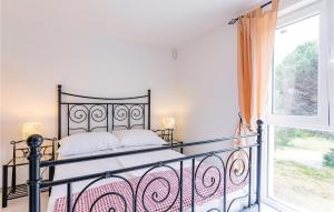 Postel nebo postele na pokoji v ubytování Holiday Home Valbandon I
