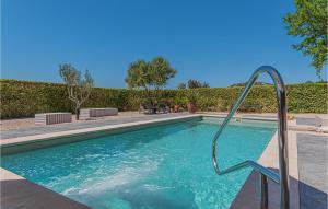 a swimming pool with a slide in a yard at Lovely Home In Jadrija With Wifi in Jadrija +53 photos