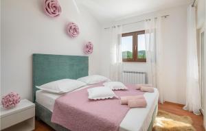 Postel nebo postele na pokoji v ubytování Holiday Home Blato Na Cetini 9