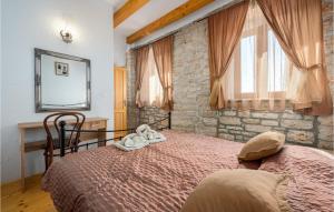Postel nebo postele na pokoji v ubytování Holiday Home Golubovo With Fireplace I