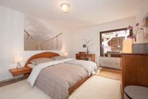 Ένα ή περισσότερα κρεβάτια σε δωμάτιο στο Apartment Freiburg Waldrand