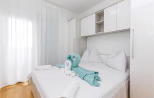 Posteľ alebo postele v izbe v ubytovaní Nice Apartment In Crikvenica