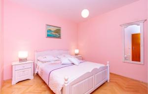 Postel nebo postele na pokoji v ubytování Holiday Home Prizba Bb